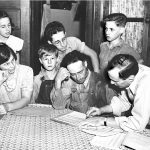 Farm Security Administration (FSA) county supervisor reviewing a farm plan with a Wisconsin farmer and his family. Photograph by John Vachon, September 1939, courtesy of the Wisconsin Historical Society, Image ID 25048.