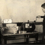 Grade-school children using a Babcock butter fat testing device, Balsam Lake, Wisconsin, c. 1915. Courtesy of the University of Wisconsin Archives.