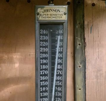 An image of an old themometer