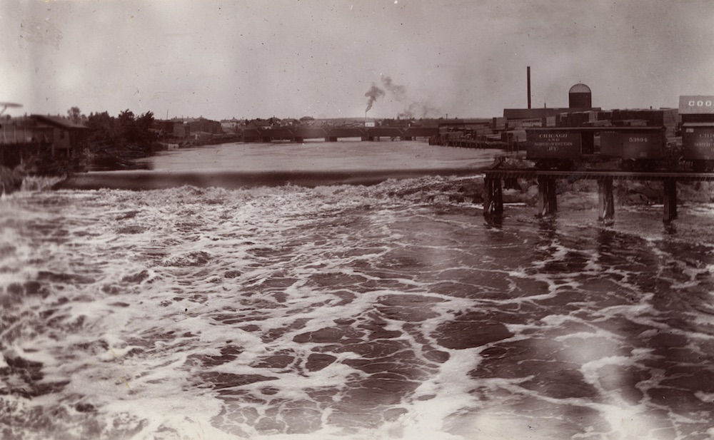 a black and white photograph showing the falls along the Wisconsin River that made Wausau attractive for logging interests