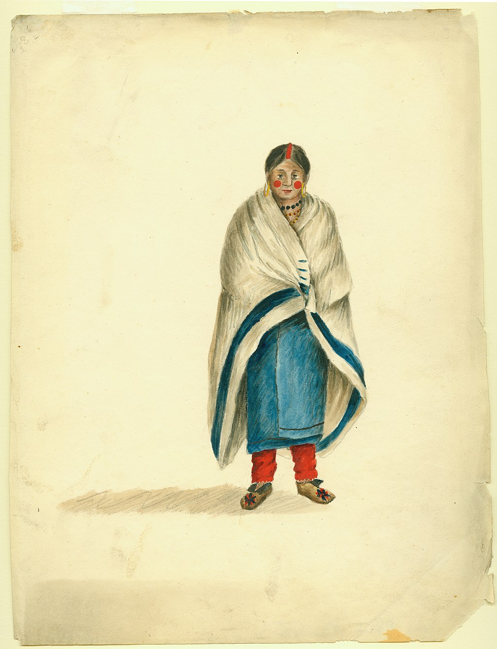 A Native American woman wearing a white trade blanket with a wide blue stripe along its edge.