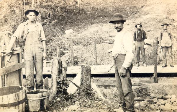 A group of miners on the surface of a lead mine in southern Wisconsin