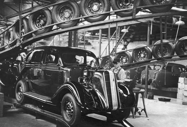 An assembly line with a car under construction