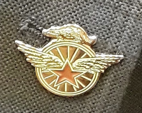 a photograph of the Badger Wheelmen Pin