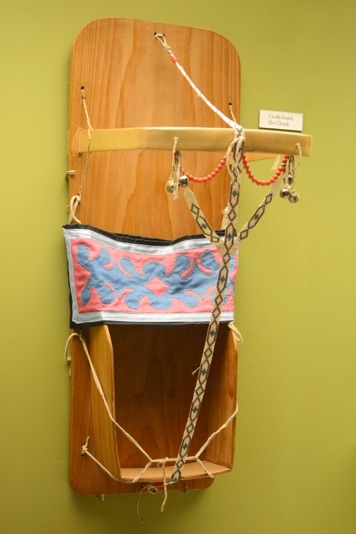 a picture of a wooden cradleboard