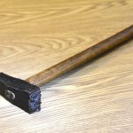 An image of a log marking hammer