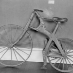 a black and white picture of the Crab Tree Special bicycle, showing the wooden frame and wheels