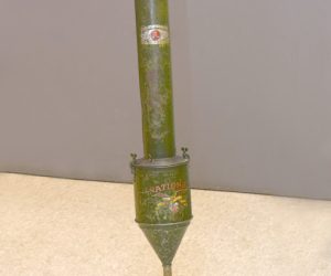 image of a green hand-powered vacuum